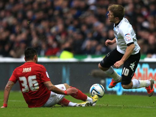 Gonzalo Jara tackles Jamie Ward