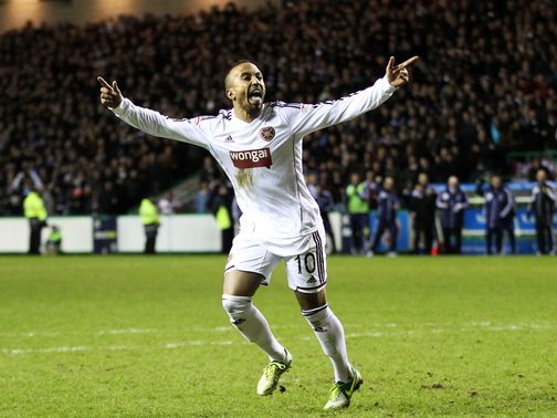 Mehdi Taouil celebrates scoring from the spot for Hearts