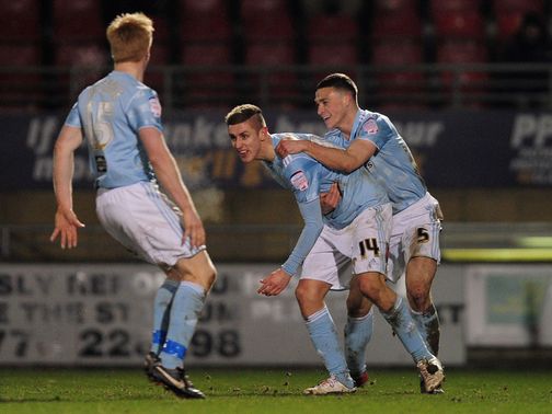 Tom Cairney celebrates his goal for Hull