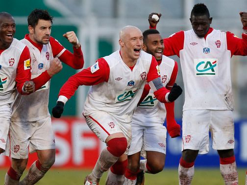 Nancy celebrate their victory on penalties