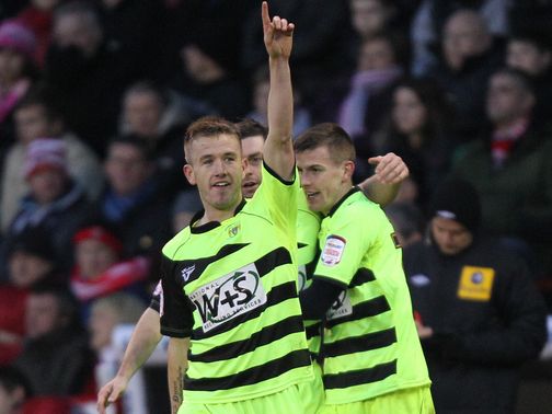 Paddy Madden celebrates scoring for Yeovil