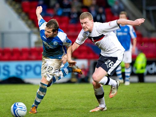 Peter Pawlett tries to get away from Brian Easton