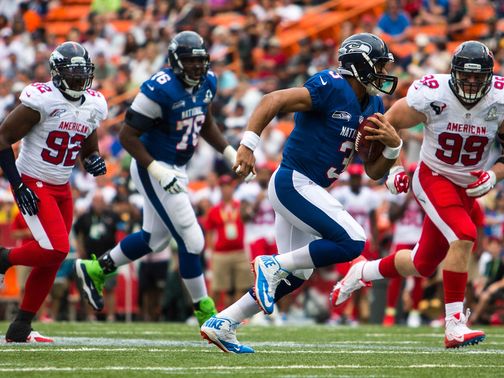 Quarterback Russell Wilson scrambles for the NFC