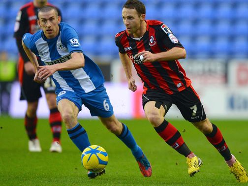 David Jones chases Bournemouth's Marc Pugh