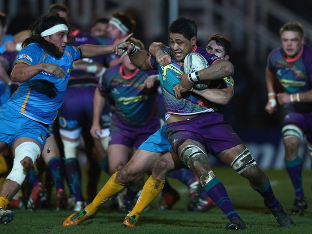 Toby Faletau's progress is halted.