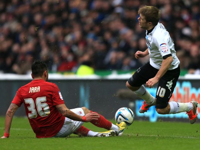 Gonzalo Jara tackles Jamie Ward