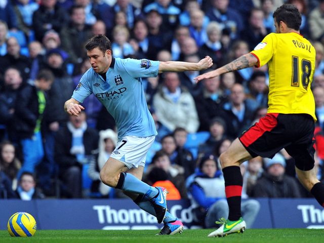 James Milner tries to get past Daniel Pudil