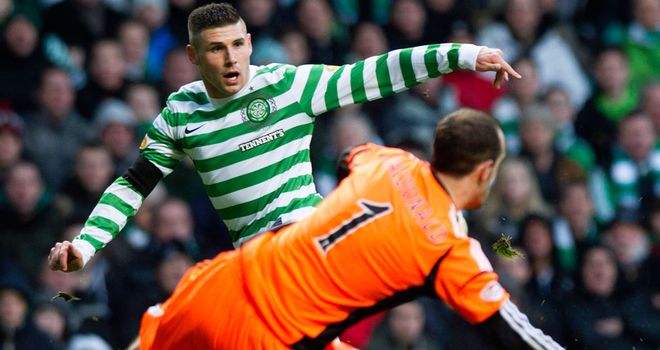 Gary Hooper scores his second goal against Hearts