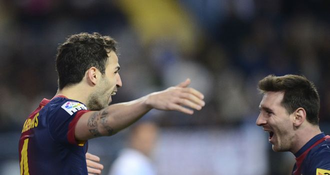 Fabregas and Messi celebrate for Barcelona