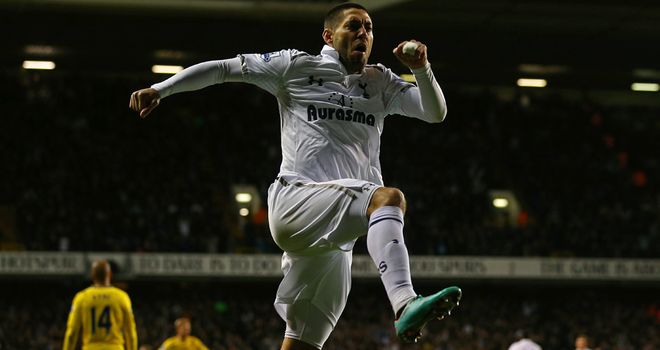 Clint Dempsey celebrates after making the game safe for Spurs