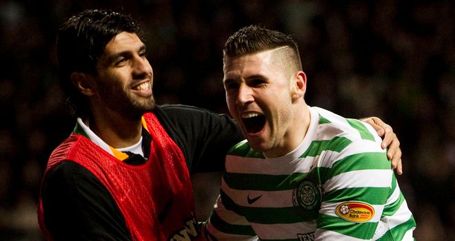 Gary Hooper: Celtic striker celebrates his goal against Motherwell