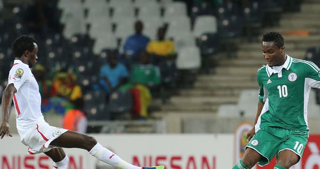 John Obi Mikel: In action for Nigeria against Burkino Faso