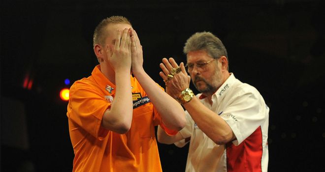 Martin Adams applauds Jimmy Hendriks after his surprise victory