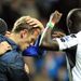 Phil Neville takes a sore one in the closing stages