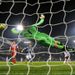 QPR goalkeeper Robert Green dives across his goal to make a great save at Loftus Road