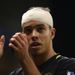 Di Santo claps Wigan's travelling supporters after a welcome away point is earned