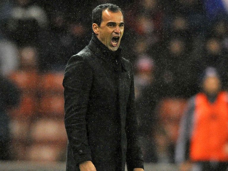 Martinez says all managers face the same pressures