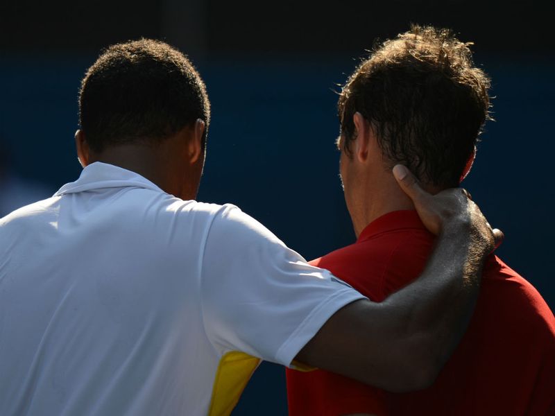 ... and then consoles Richard Gasquet