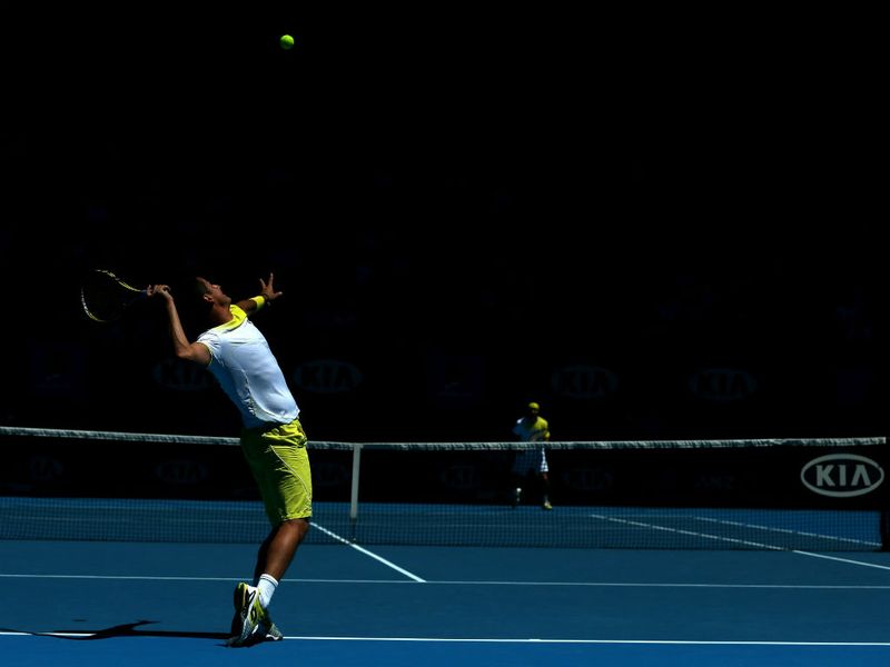 Nicolas Almagro serves to David Ferrer during an enthralling contest...