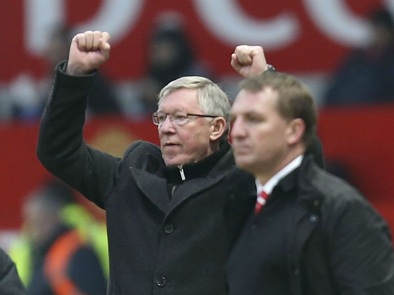 Winning feeling: Alex Ferguson celebrates at the final whistle as Man United beat Liverpool 2-1 to go temporarily ten points clear in the Premier League