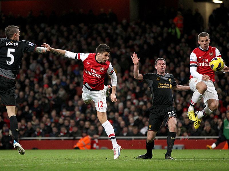 Olivier Giroud heads home to pull a goal back for the Gunners...