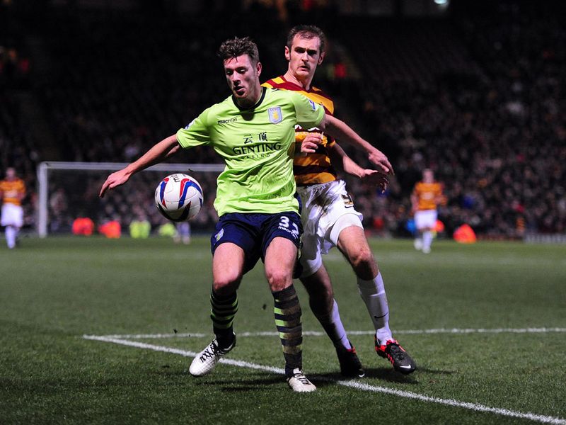 Nathan Baker and James Hanson battled for the ball