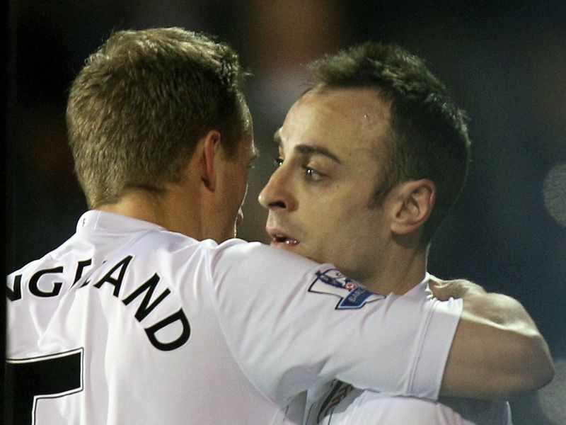 Dimitar Berbatov scores the opener in Fulham's clash with West Ham at Craven Cottage
