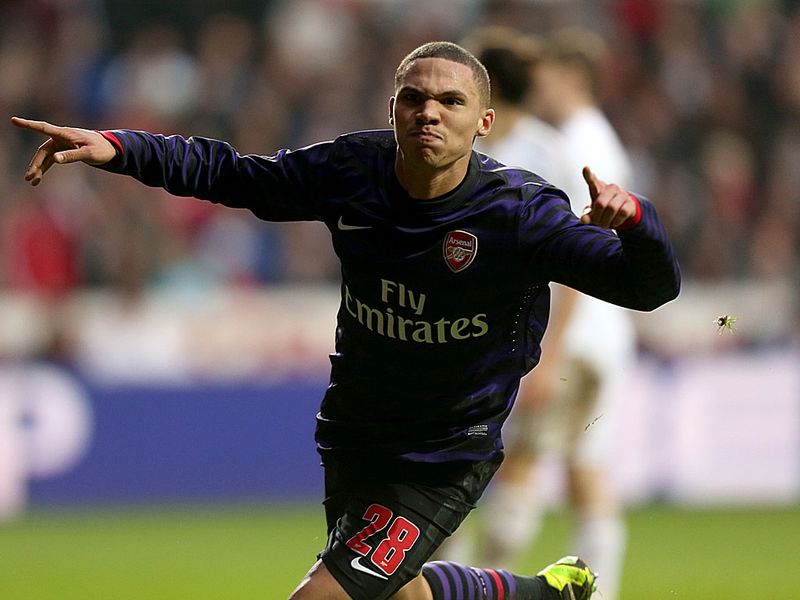 Kieran Gibbs wheels away and the Arsenal fans behind the goal go wild as a superb move puts the Gunners in front.