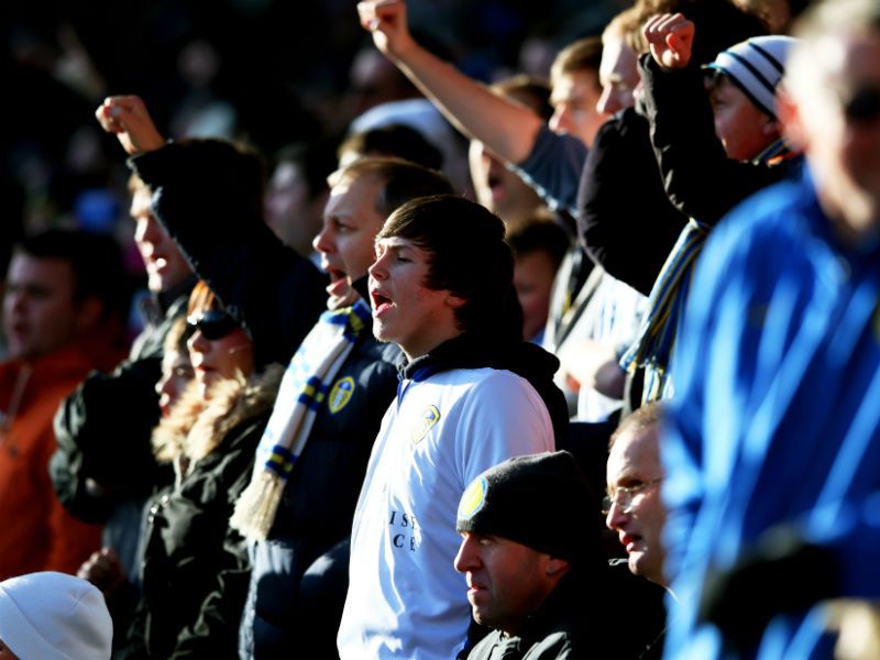 In good voice: Leeds fans cheer on their team against Spurs