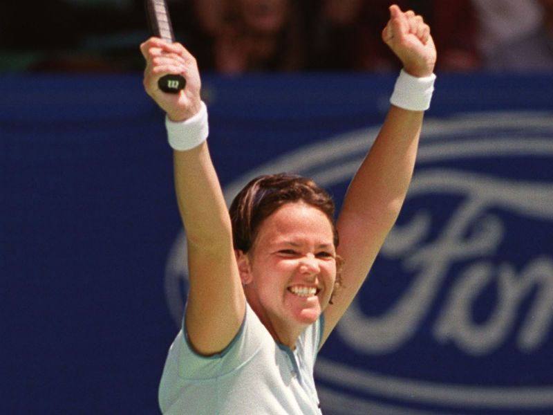 Lindsay Davenport: Celebrates winning the 2000 Australian Open, also beating Hingis