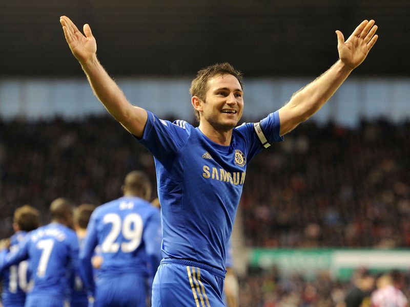 Frank Lampard salutes the travelling supporters after firing Chelsea 3-0 up at Stoke
