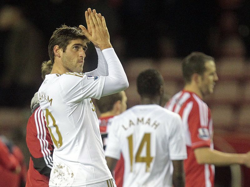 Danny Graham applauds the Swansea fans after a goalless draw at Sunderland - the club many expect him to be playing for next month