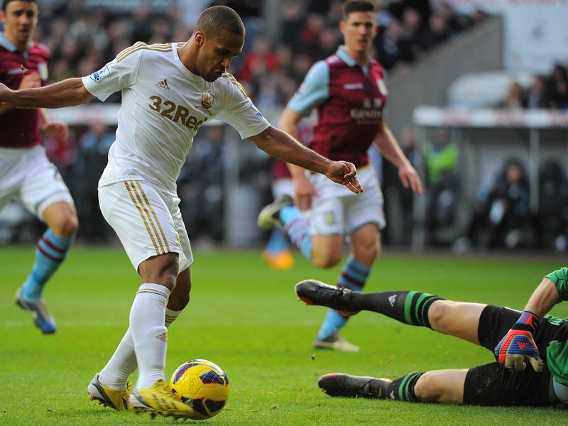 Wayne Routledge gives Swansea the lead against Aston Villa, but the Swans needed a last-gasp strike to salvage a 2-2 draw