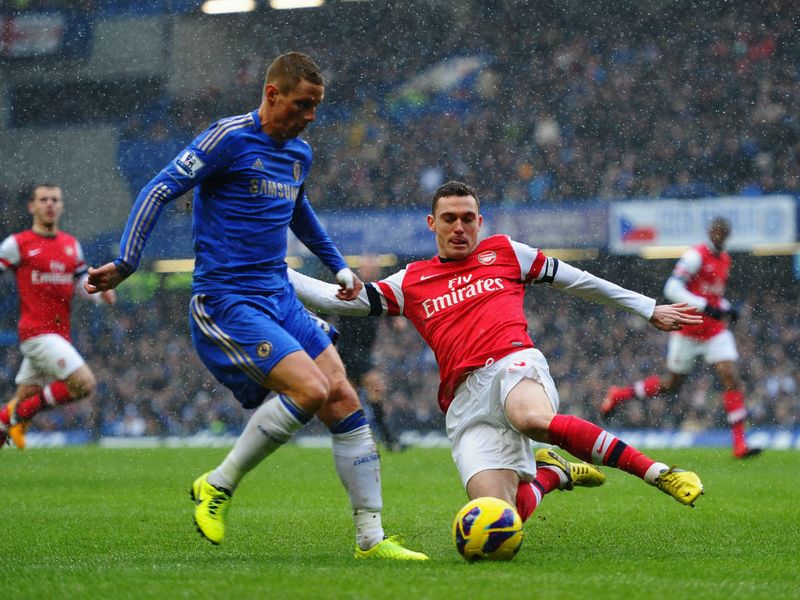 Fernando Torres, sporting a new haircut, was unable to find a way past Thomas Vermaelen early on, but the deadlock was soon broken.