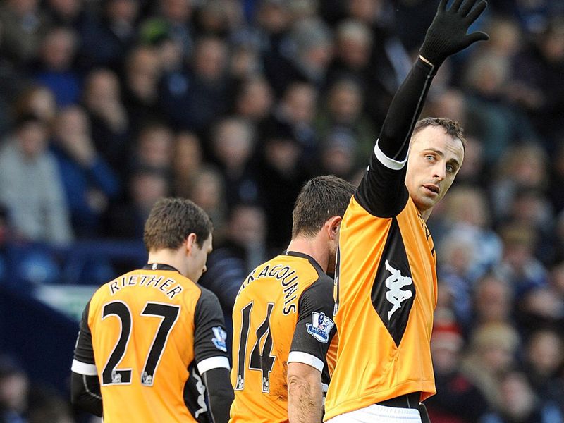 Berbatov celebrates his first-half strike
