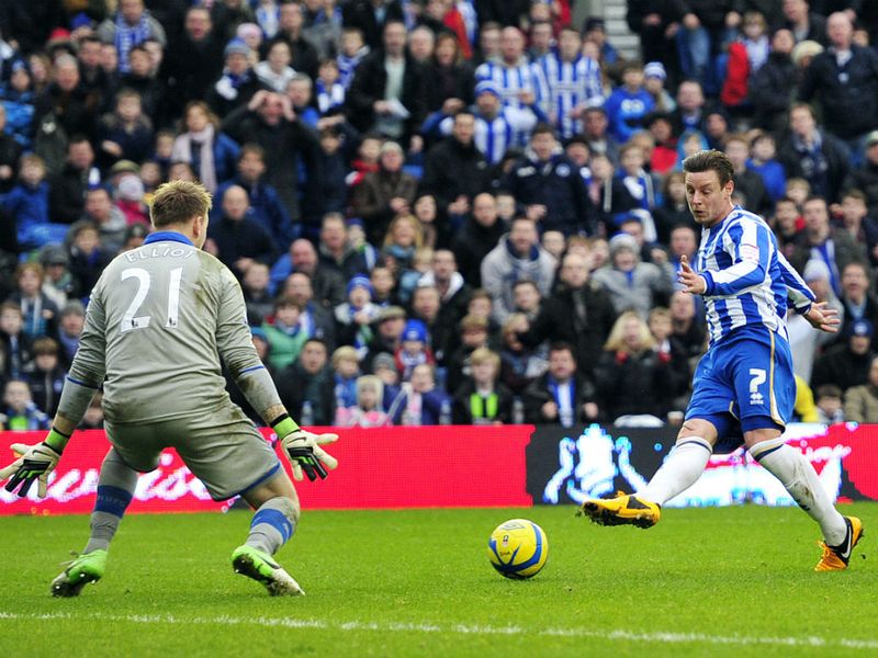Will Hoskins beats the offside trap and slides the ball through Rob Elliott's legs as Brighton win the game 2-0 and progress to the fourth round.