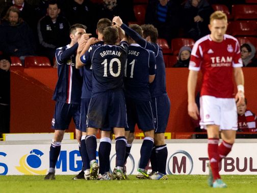 Ross County celebrate Gary Glen's winning goal