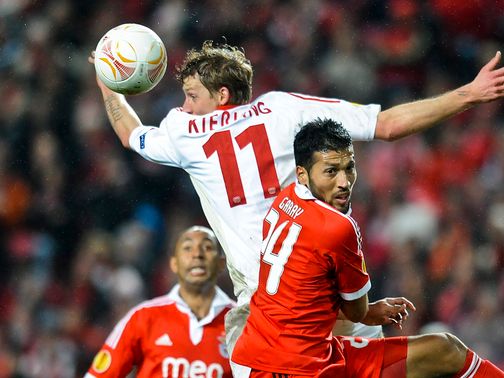 Stefan Kiessling and Ezequiel Garay battle for the ball