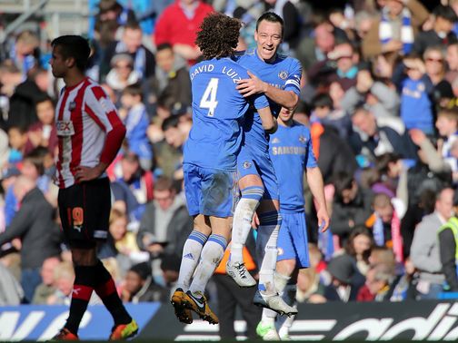 John Terry celebrates his goal in Chelsea's win against Brentford.