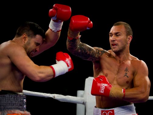 Quade Cooper (r): First-round KO on debut&nbsp;