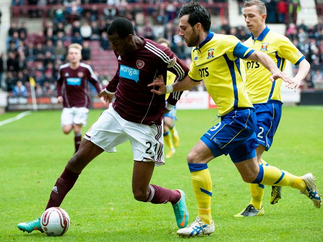 Michael Ngoo keeps possession.