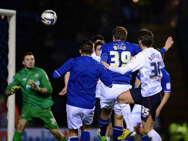 Chris Wood scores the opening goal for Leicester
