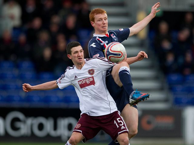 Jason Holt battles it out with Scott Boyd.