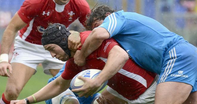 Wales forward Ryan Jones takes the fight to Italy