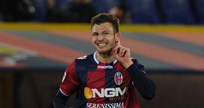 Marco Motta celebrates his goal for Bologna