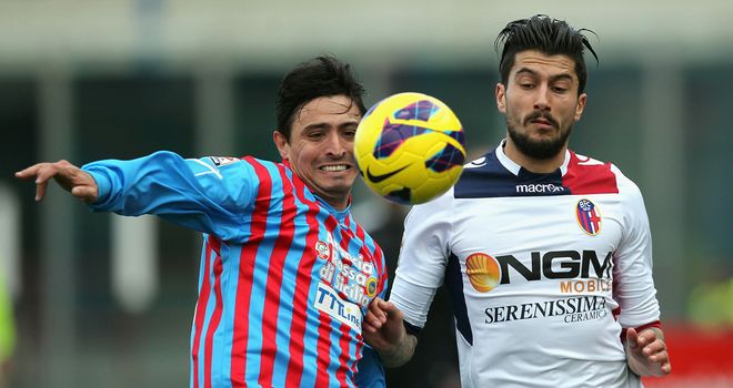 Pablo Alvarez and Panagiotis Kone challenge for the ball