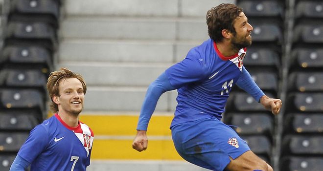 Darijo Srna: Celebrates scoring on his 100th appearance for Croatia