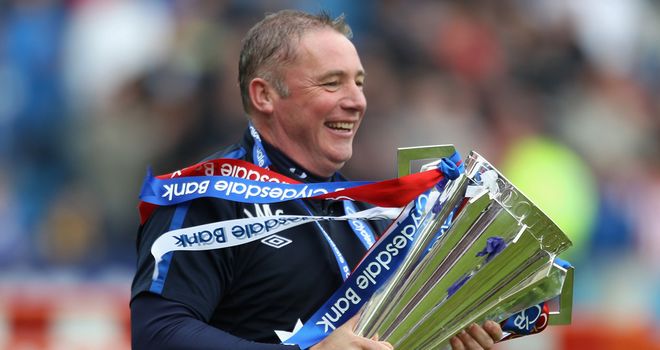 Ally McCoist: The then-assistant boss to Walter Smith with the 2010/11 trophy.