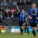 Chris Dagnall points to the sky after opening the scoring for Barnsley at MK Dons