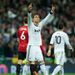 Cristiano Ronaldo raises his arms in celebration after scoring Real Madrid's equaliser against his former club Manchester United